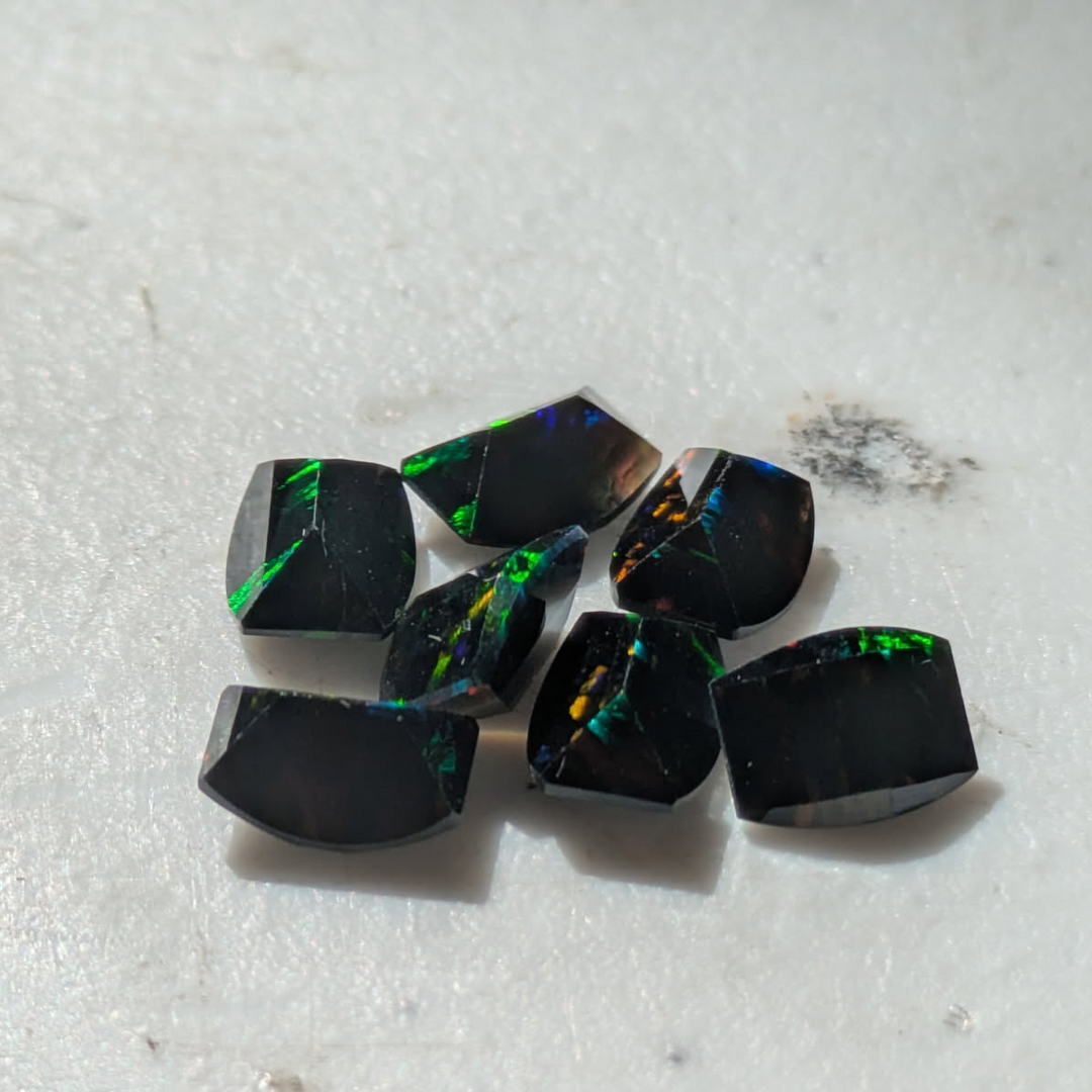 8 x 6mm Black Faceted Roll-Top Opal